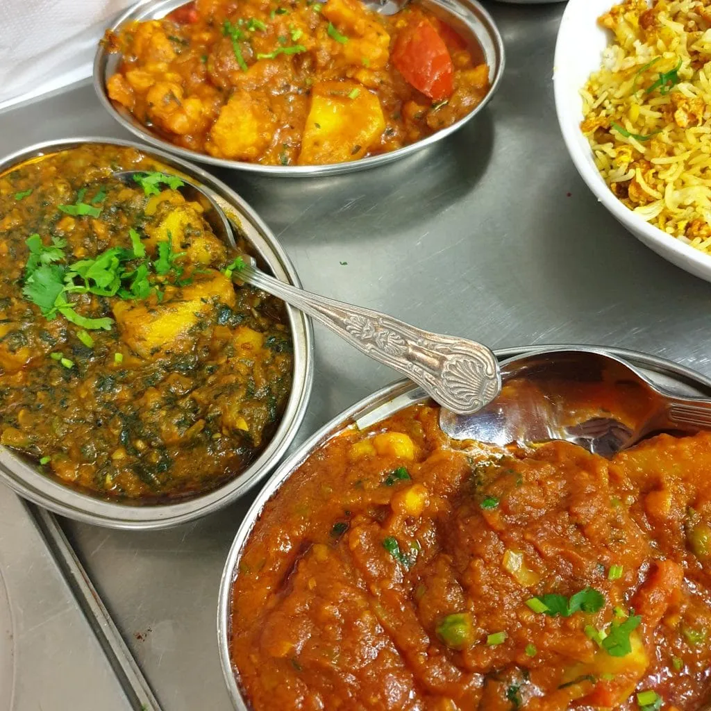 A table spread of freshly prepared dishes