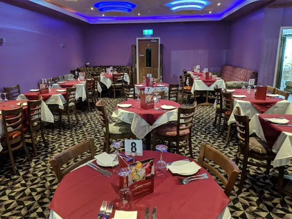 A quiet corner of the restaurant with warm lighting and welcoming decor.